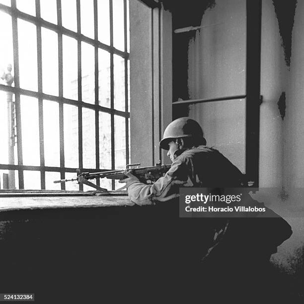 Soldier stands guard inside La Moneda, days after the coup d'etat led by Commander of the Army General Augusto Pinochet in Santiago.