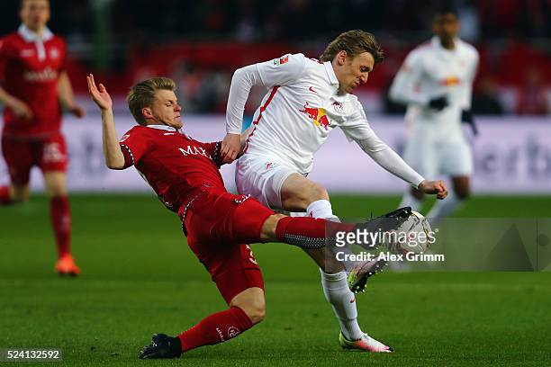 Emil Forsberg of Leipzig is challenged by Jean Zimmer of Kaiserslautern during the Second Bundesliga match between 1. FC Kaiserslautern and RB...