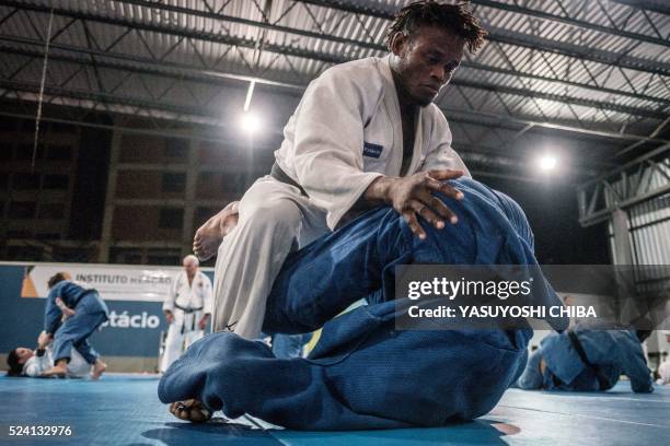 Popole Misenga a refugee judoka from the Democratic Republic of Congo, during a training at Instituto Reacao in Rio de Janeiro, Brazil, on April 14,...