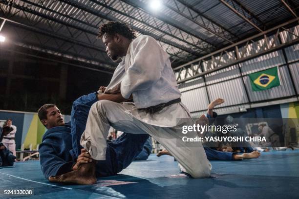 Popole Misenga a refugee judoka from the Democratic Republic of Congo, during a training at Instituto Reacao in Rio de Janeiro, Brazil, on April 14,...