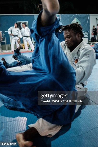 Popole Misenga a refugee judoka from the Democratic Republic of Congo, during a training at Instituto Reacao in Rio de Janeiro, Brazil, on April 14,...