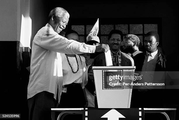Nelson Mandela casts his historic vote in a small voting station on April 27, 1994 at Oshlange High School outside Durban, South Africa. The historic...