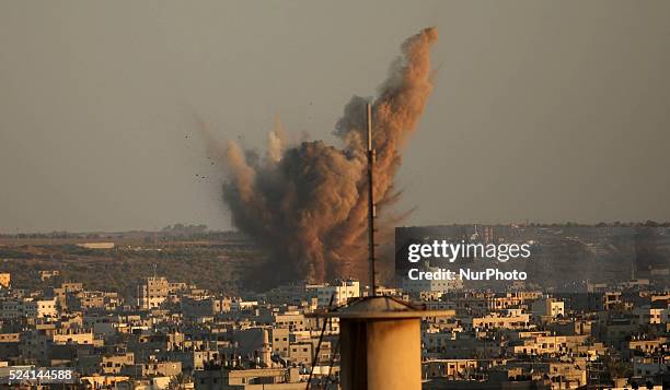 Smoke rises following what witnesses said was an Israeli air strike in Gaza August 20, 2014. Arab League chief Nabil al-Arabi accuses Israel of...