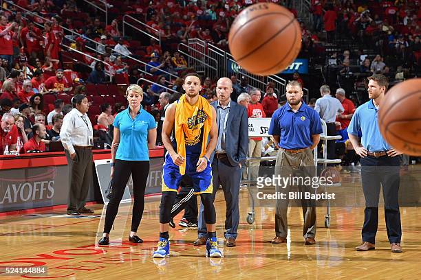 Stephen Curry of the Golden State Warriors comes out of the locker room after halftime and warms up during Game Four of the Western Conference...