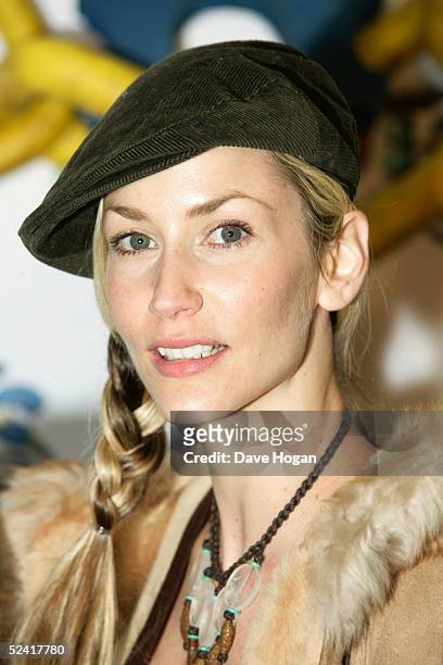 Model Lisa Butcher arrives at the UK premiere of the animated film "Robots" at Vue Leicester Square March 14, 2005 in London.