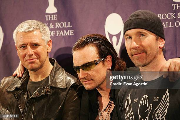 Inductees Adam Clayton, Bono and The Edge of the rock group U2 pose backstage at the 20th Annual Rock And Roll Hall Of Fame Induction Ceremony at the...