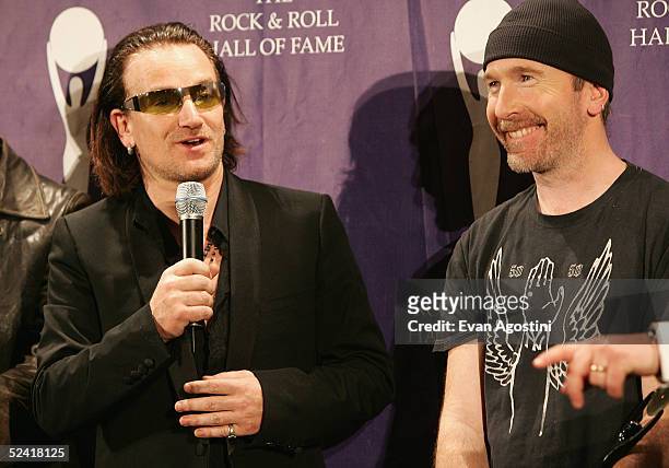 Bono and The Edge of the rock group U2 pose backstage at the 20th Annual Rock And Roll Hall Of Fame Induction Ceremony at the Waldorf Astoria Hotel...