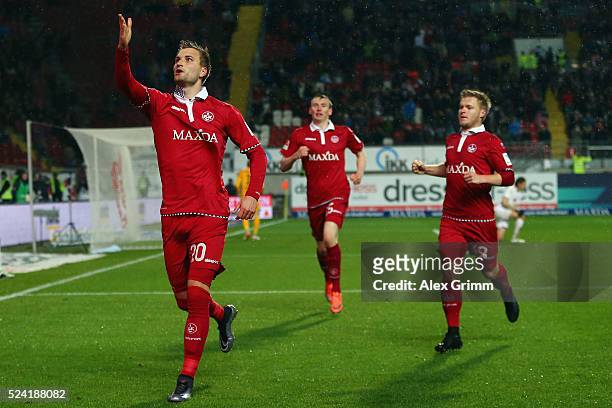 Kacper Przybylko of Kaiserslautern celebrates his team's first goal with team mates Jean Zimmer and Jon Dadi Bodvarsson during the Second Bundesliga...