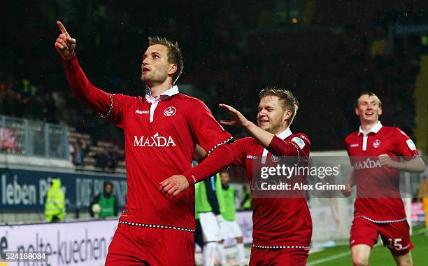 Kacper Przybylko of Kaiserslautern celebrates his team's first goal with team mates Jean Zimmer and Jon Dadi Bodvarsson during the Second Bundesliga...