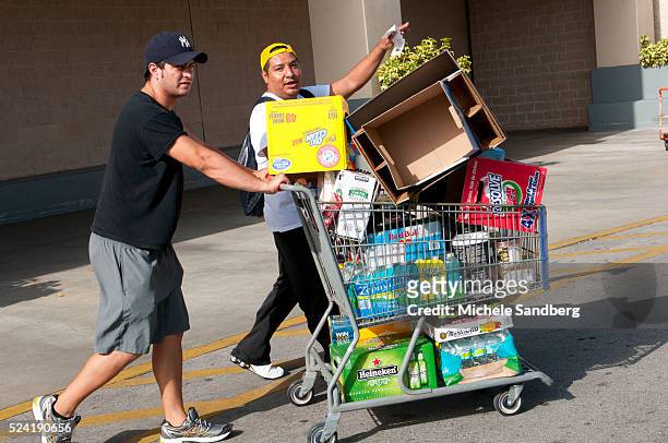 August 23, 2012 ANDRES DIAZ AND RENEE CHAVEZ buy food, beverages and supplies in preparation for Storm Isaac. South Florida prepares for Storm Isaac.