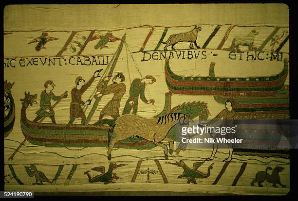 Segment of the Bayeux Tapestry which depicts the Norman Conquest of England. The embroidered linen tapestry dates from around 1080. Bayeux, Normandy,...