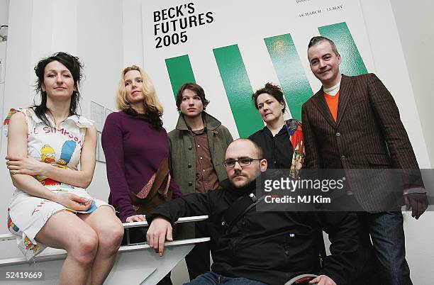 Shortlisted artists Lali Chetwynd, Daria Martin, Luke Fowler, Ryan Gande, Christina Mackie and Donald Urquhart pose at the exhibition for...