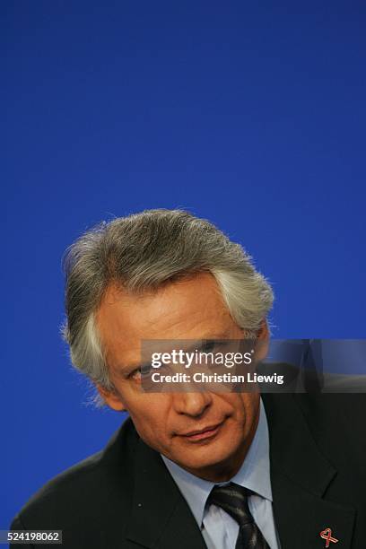 French Prime Minister Dominique de Villepin arrives to give his monthly press conference in Paris.