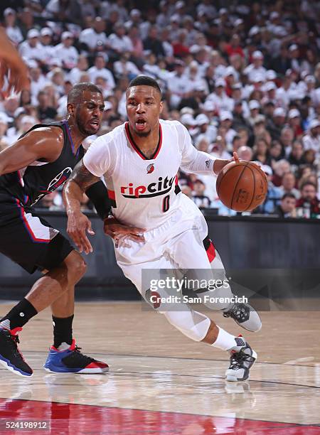 Damian Lillard of the Portland Trail Blazers drives against Chris Paul of the Los Angeles Clippers in Game Three of the Western Conference...