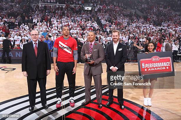 McCollum of the Portland Trail Blazers is presented with the 2015-16 Kia NBA Most Improved Player of the Year award from Will James, Retail Marketing...