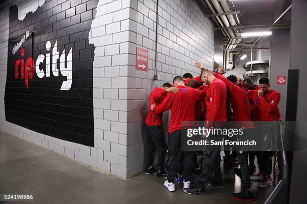 The Los Angeles Clippers huddles up prior to the game against the Portland Trail Blazers in Game Three of the Western Conference Quarterfinals during...