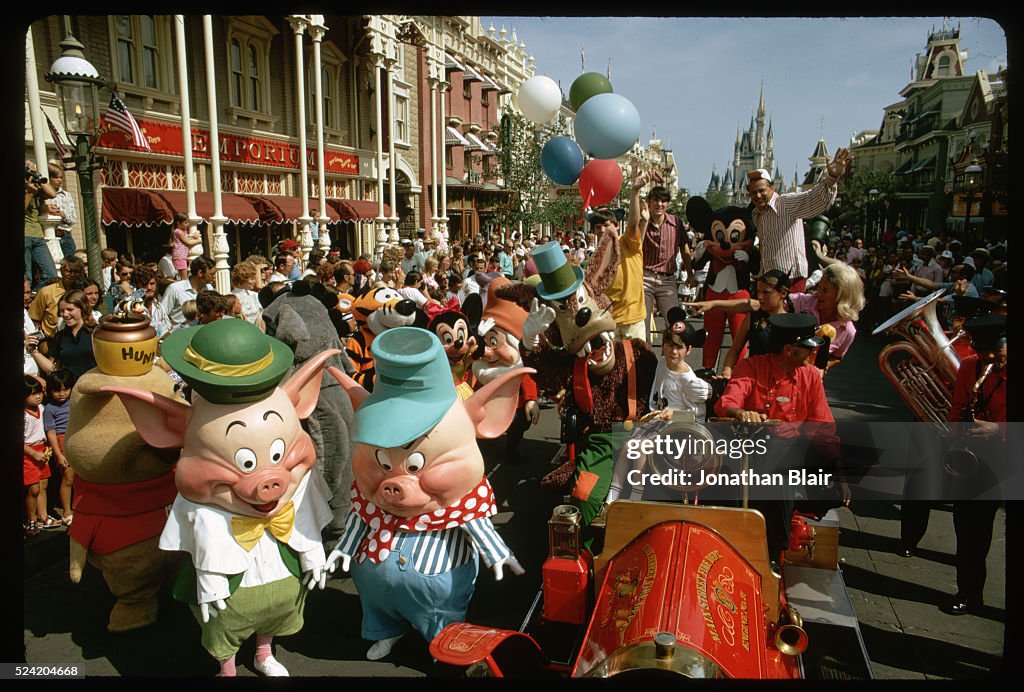 Tourists and Disney Characters in Parade