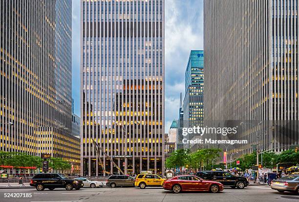 view of the sixth avenue and w 49th st - sixth avenue stock pictures, royalty-free photos & images