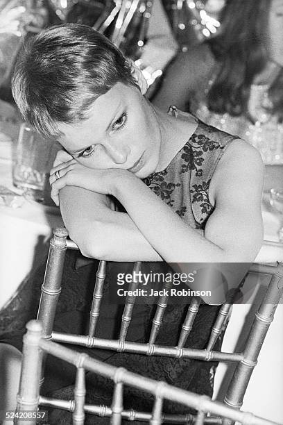 Portrait of American actress Mia Farrow as she attends a party in celebration of the 25th marriage anniversary of Betty Comden and her husband, Steve...