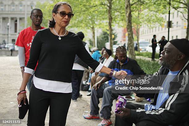 Baltimore mayoral candidate Sheila Dixon greets people during a rally to mark the anniversary of the death of city resident Freddie Gray at the War...