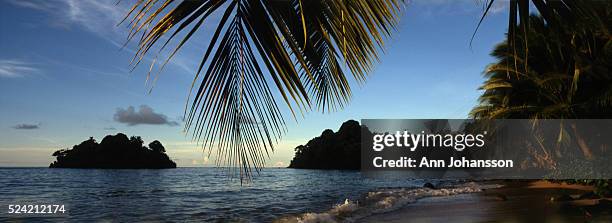 The sun sets on Upolu Island, Western Samoa. | Location: Upolu Island, Western Samoa.