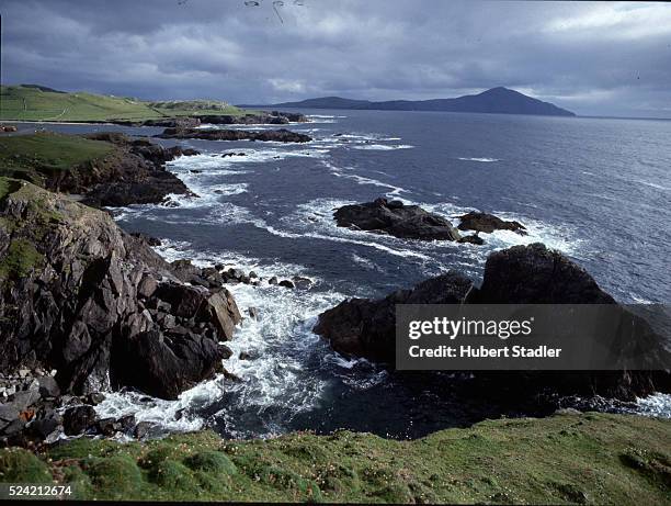The rocky coastline of Achill Island, County Mayo, Republic of Ireland. The remote island is joined to the mainland by a bridge.