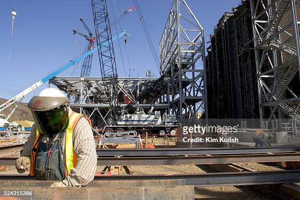 Workers are seen at the Calpine, 600 MW Metcalf Energy Center under construction in San Jose, California.