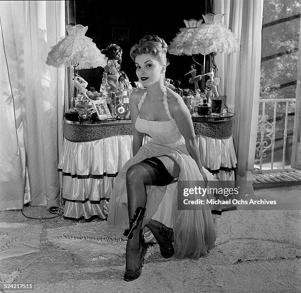 Actress Debra Paget poses in stockings in Los Angeles,CA.