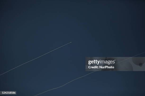 Smoke trails are seen as rockets are launched from the Gaza Strip towards Israel August 20, 2014.Abu Ubaida, the spokesman of the Izz el-Deen...