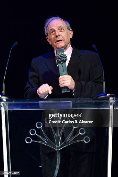 Spanish actor Emilio Gutierrez Caba receives the "Ciudad del Paraiso" Award from actress Julia Gutierrez Caba at the Cervantes Theater during the...