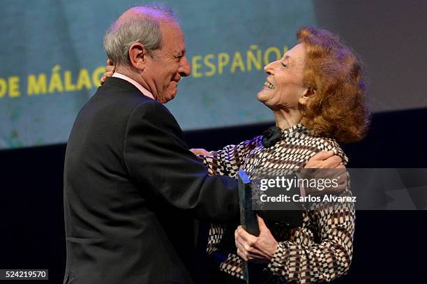 Spanish actor Emilio Gutierrez Caba receives the "Ciudad del Paraiso" Award from actress Julia Gutierrez Caba at the Cervantes Theater during the...