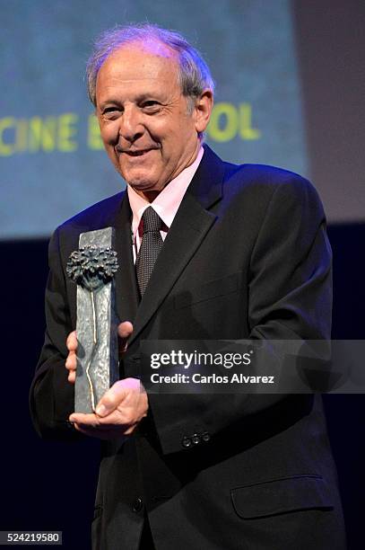 Spanish actor Emilio Gutierrez Caba receives the "Ciudad del Paraiso" Award from actress Julia Gutierrez Caba at the Cervantes Theater during the...