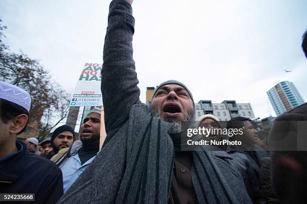 Bangladeshi and supporters protest in Altab Ali Park against the execution of leader Abdul Quader Molla convicted of war crimes during the 1971...