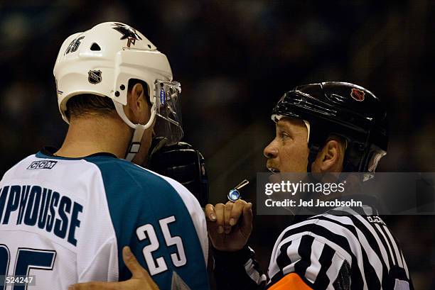 Center Vincent Damphousse of the San Jose Sharks has a discussion with the referee during game three of the Stanley Cup playoffs western conference...