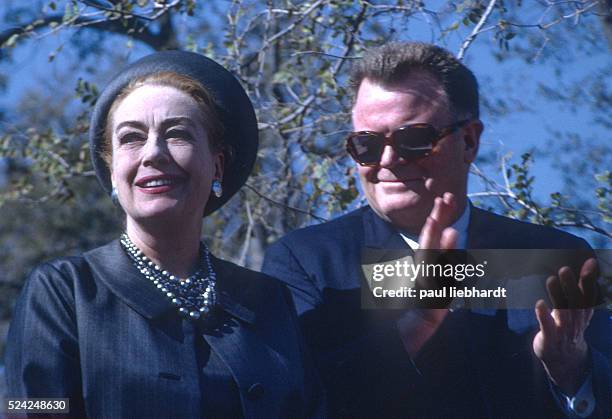 Joan Crawford, film actress and Pepsi Cola executive, receives applause after giving a speech in Houstion, Texas in 1969.