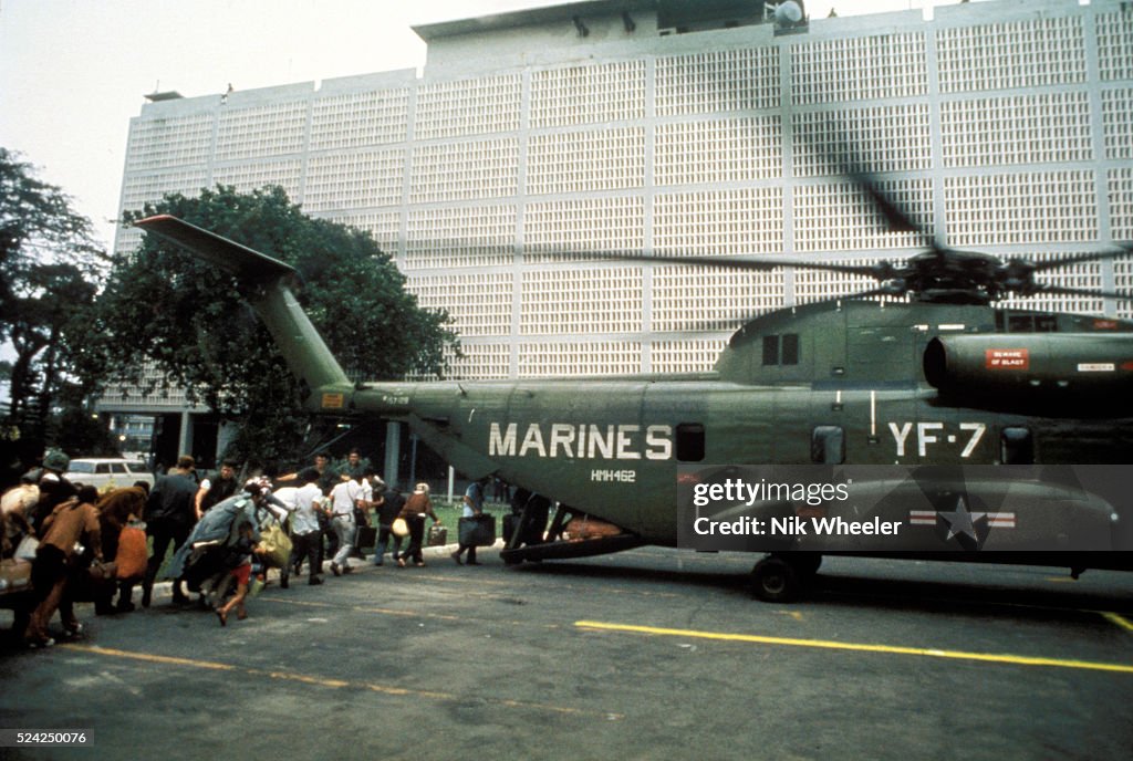 Boarding helicopter inside US Embassy , Fall of Saigon, Vietnam, 1975 m War, 1975