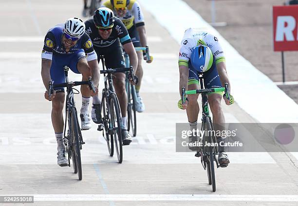 Mathew Hayman of Australia and Orica GreenEDGE wins in front of Tom Boonen of Belgium and Ettxx-Quick Step and Ian Stannard of Great Britain and Team...