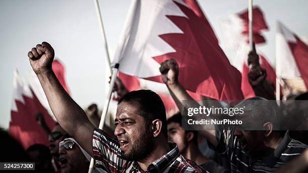 Bahrain , Abu Saiba - protester raising slogans during the demonstration , thousands attended opposiotion demonstration many raised posters and...