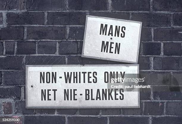 Sign designating a men's room for blacks only in Capetown, South Africa during Aparthied in 1978.