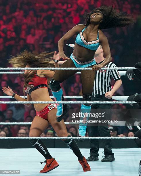 Paige and Naomi join forces to square off against The Bella Twins on WWE Monday Night Raw at the Frank Erwin Center on April 6, 2015 in Austin, Texas.