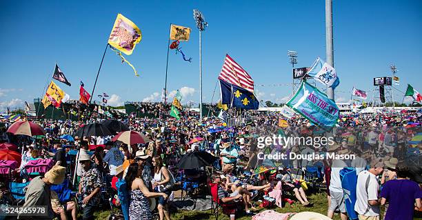 Atmosphere, crowd and flags at the New Orleans Jazz & Heritage Festival 2016 at Fair Grounds Race Course on April 22, 2016 in New Orleans, Louisiana.