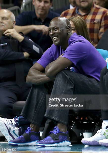 Owner of the Charlotte Hornets, Michael Jordan, watches on from the bench against the Miami Heat during game four of the Eastern Conference...