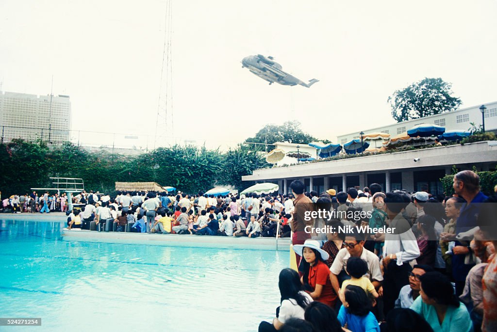 Crowded swimming pool at US Embassy, Fall of Saigon 1975