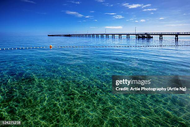 busselton jetty, geographe bay, western australia - busselton jetty stock pictures, royalty-free photos & images