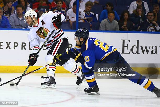 Brent Seabrook of the Chicago Blackhawks shoots the puck against the St. Louis Blues in Game Seven of the Western Conference First Round during the...
