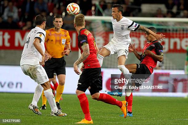 Ergys Kace and Giorgos Katsikas in action against Sylvain Marveaux during the UEFA Europa League soccer match EA Guingamp vs PAOK Thessaloniki at...