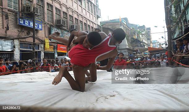 Streetside wrestling competition organised by the merchants of Burrabazar on the eve of Diwali festival in Burrabazar on 24th October 2014, in...