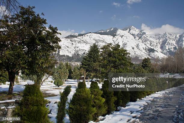 View of snow capped Zabarvan mountains on March 10, 2015 in Srinagar, the summer capital of Indian administered Kashmir, India. Sunny weather on...