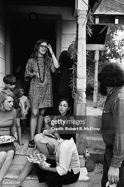 New York Film Festival visitors enjoy refreshments outside the USCO Group's studios, formerly a church, during an USCO group multimedia event,...