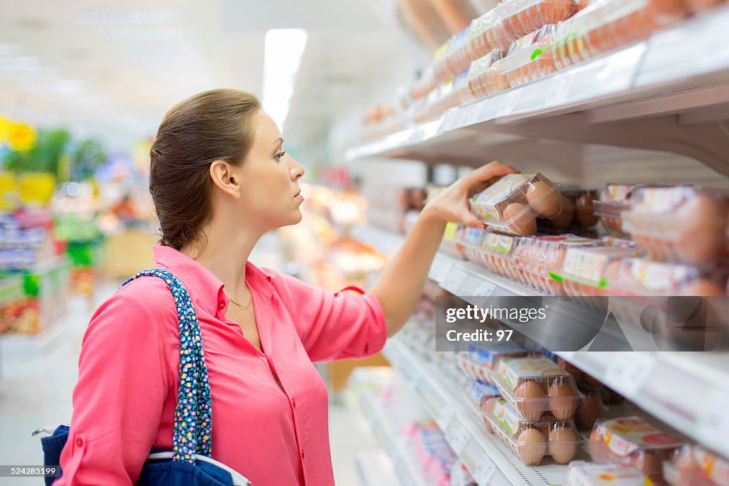 Woman buys eggs